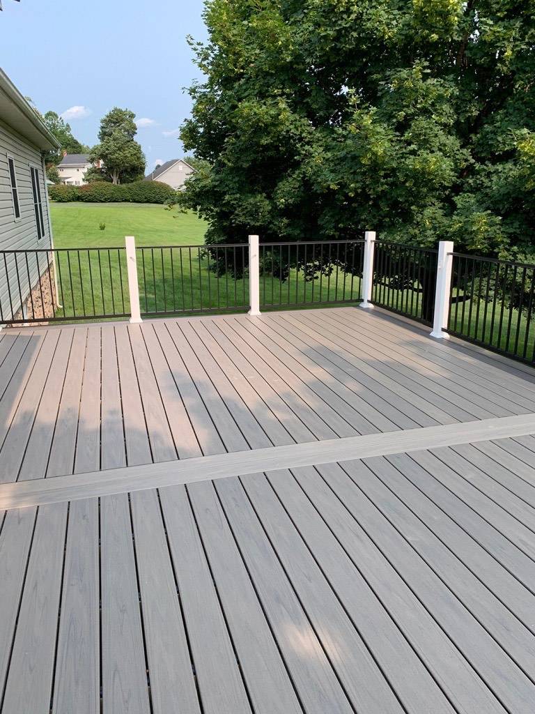 Composite deck with black railing.