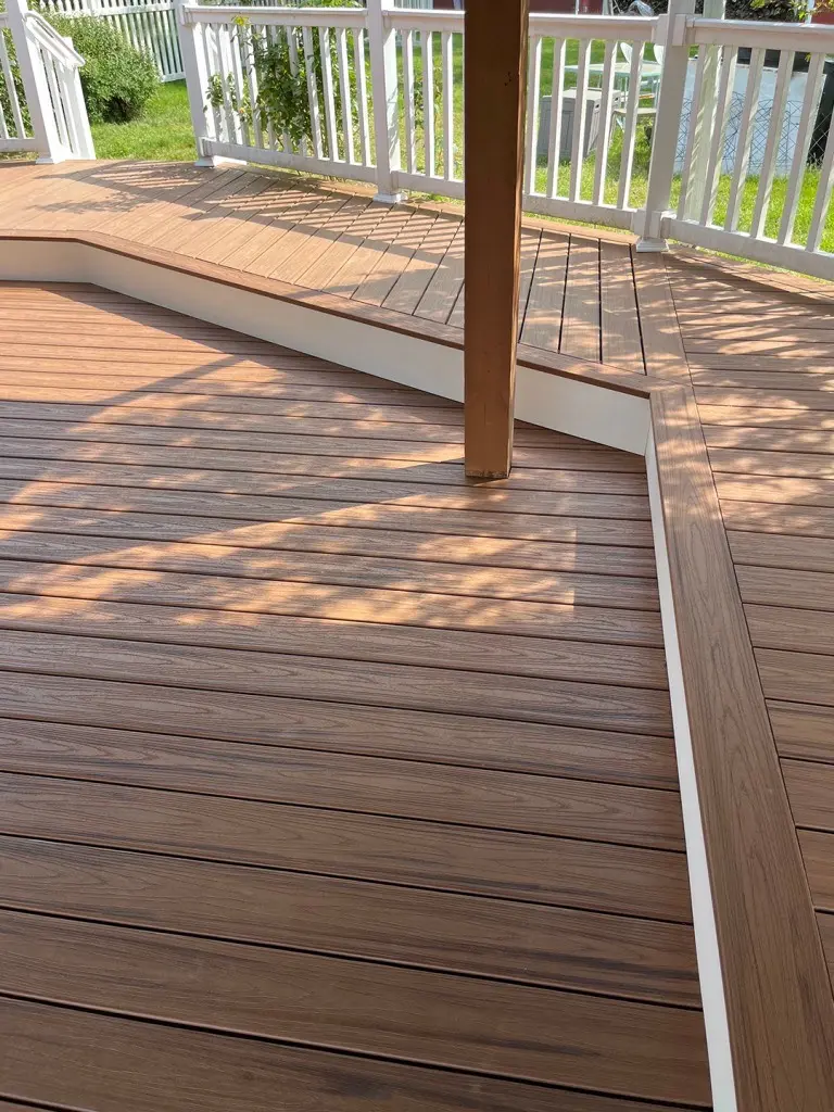 Multi-level deck with railings.