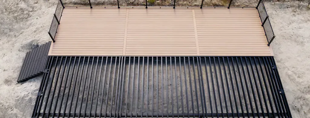 Aluminum deck framing beneath composite deck boards