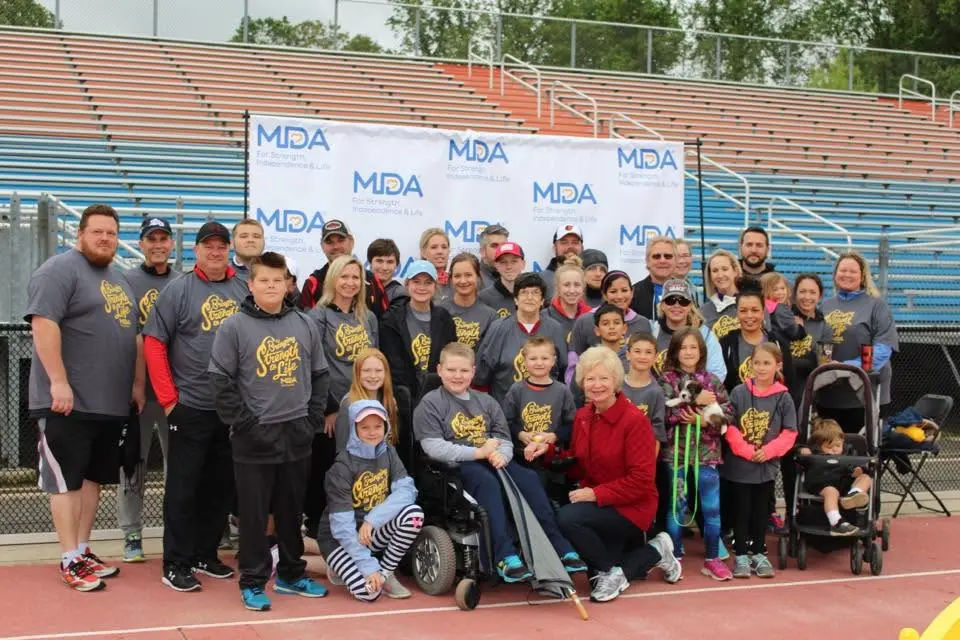Classic Remodeling team and families at a community walk supporting families affected by SMA