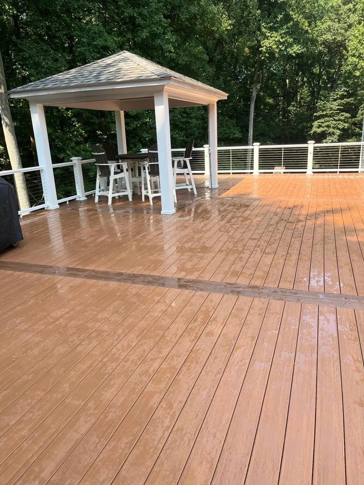 TimberTech Vintage Cypress framed in Mahogany with cable railing, Clarksville, MD.