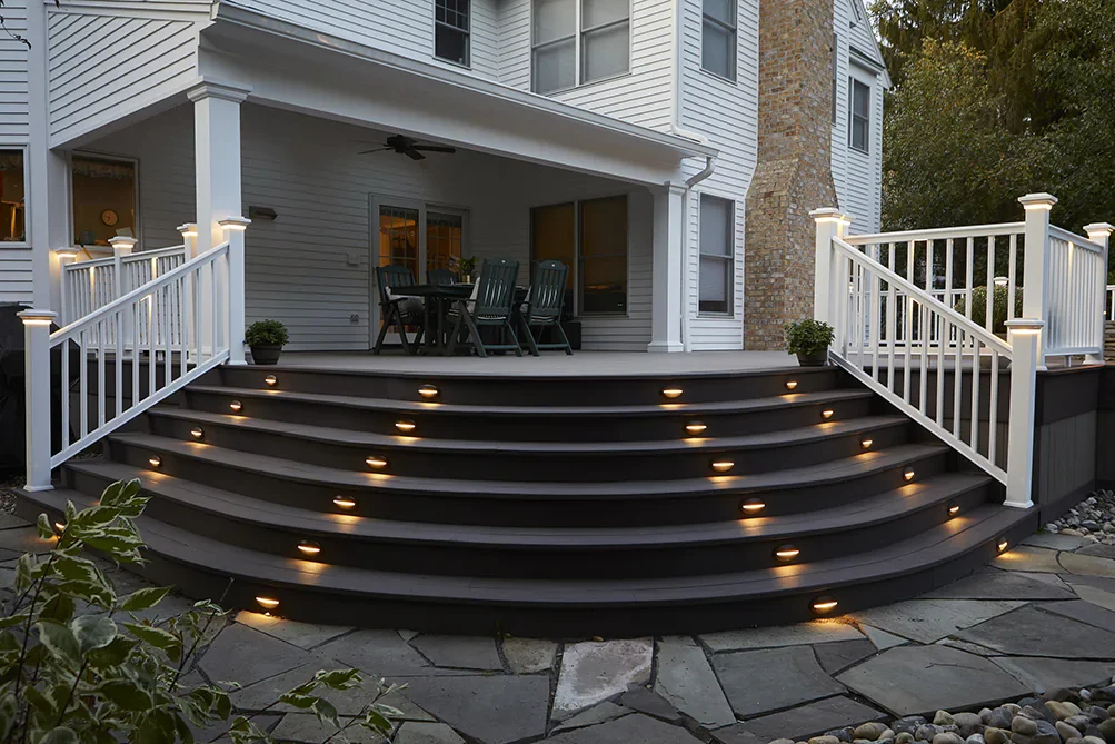 Deck lighting integrated into stairs and railings