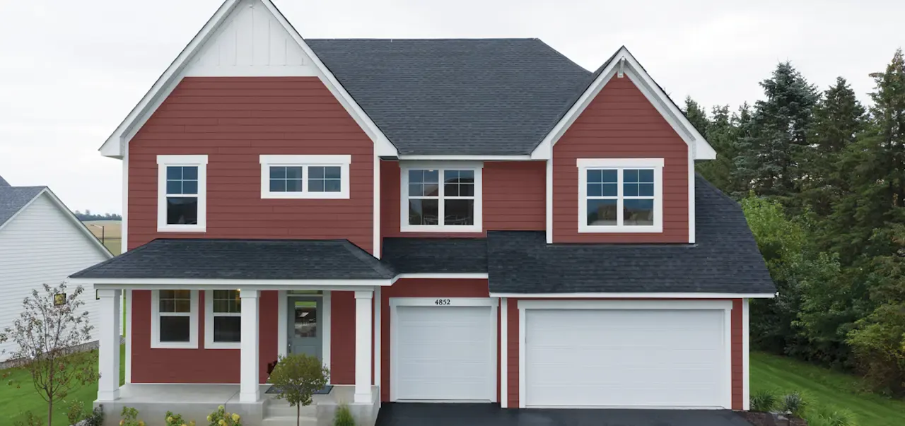 LP SmartSide engineered wood siding in Redwood Red.