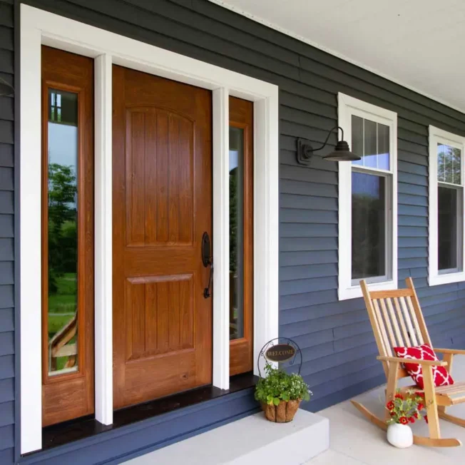 Signet knotty alder entry door in Caramel.