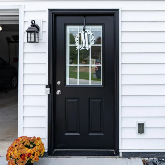 Legacy steel 440 door in black with white internal grids.